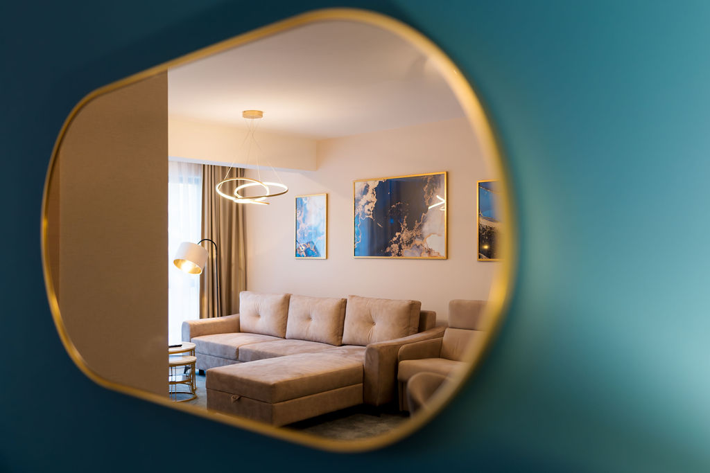 Suite living area reflected in organic mirror