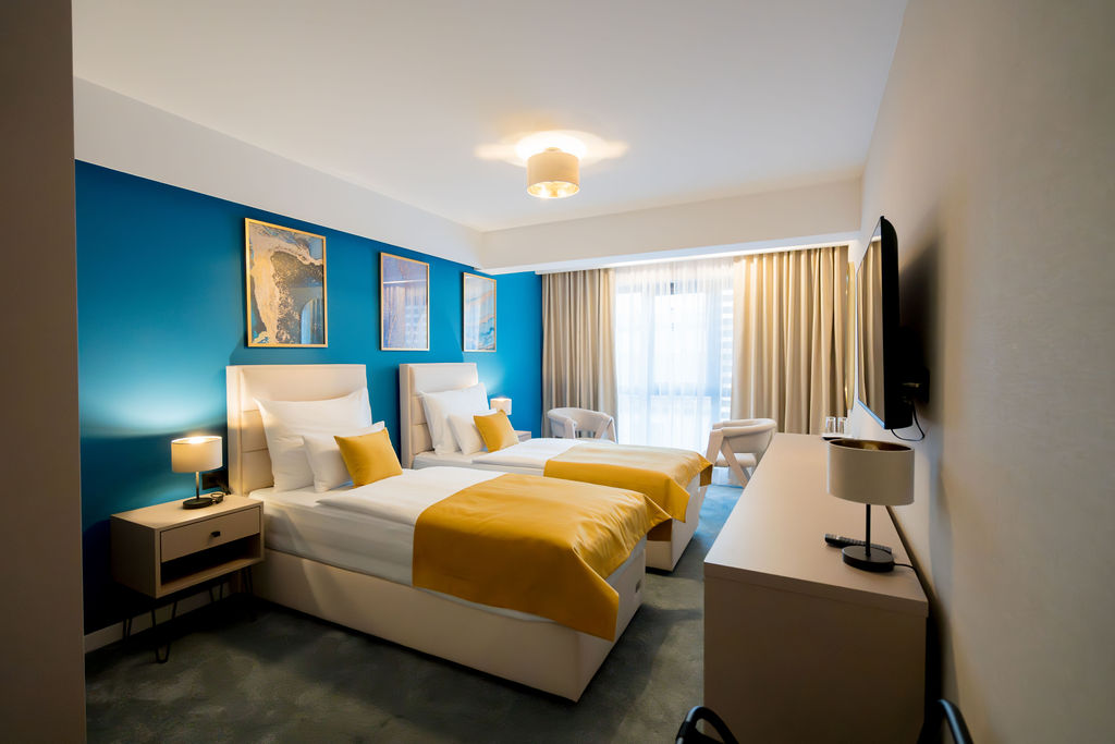 Twin Room with gold accents